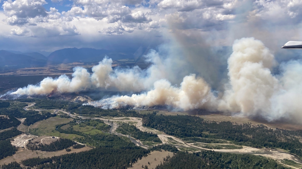 Hay River Wildfire Evacuation: Urgent Move to Airport Amidst Blaze